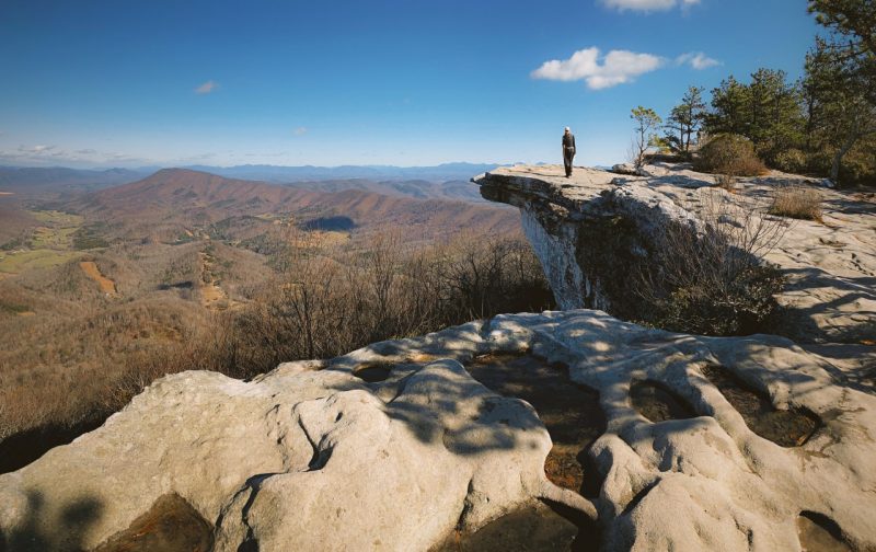 McAfee Knob overlook with person standing near the edge.