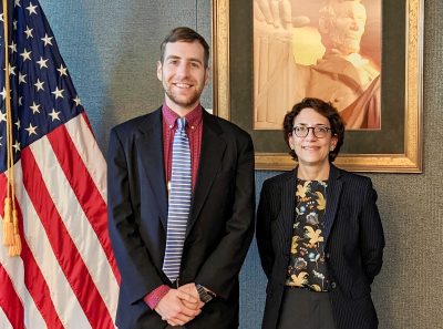 Photo of Jason Schwartz standing with Deputy Secretary of Transportation Polly Trottenberg.