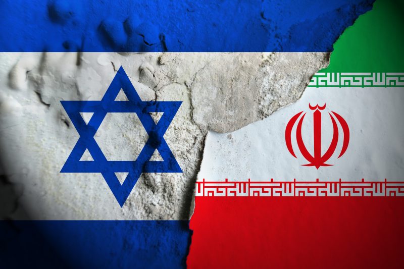 The flags of Israel and Iran. Image via Adobe Stock