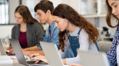 Students focusing on their computers
